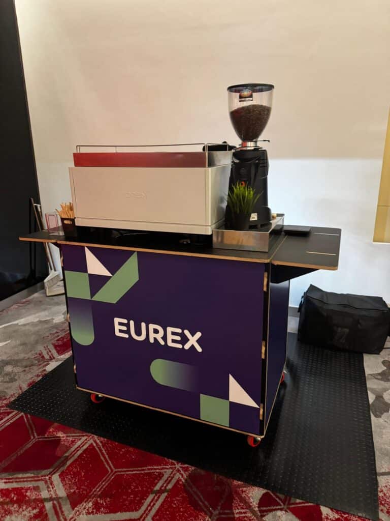 Purple Eurex branded coffee bar by Tom’s Coffee at the FIA IDX 2026 exhibition