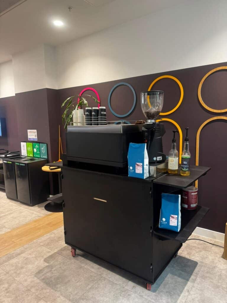 Tom’s Coffee fully managed coffee bar setup with commercial espresso machine and on-demand grinder